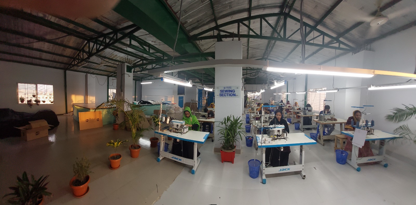 Modern sewing section with multiple workstations Brandex Sourcing factory floor
